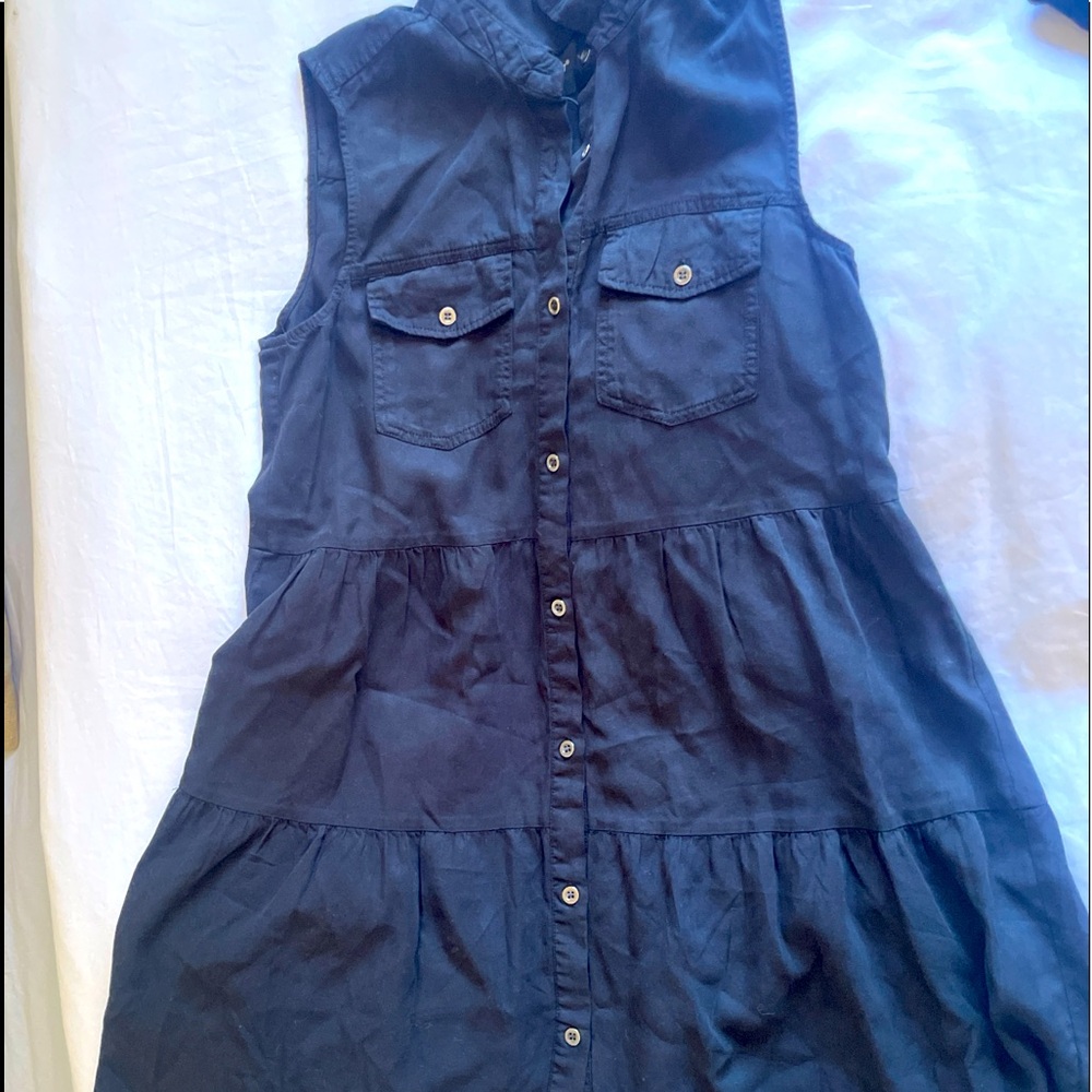 Black sleeveless collared button down dress